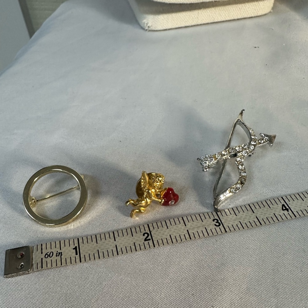 Cupids love pin brooch group